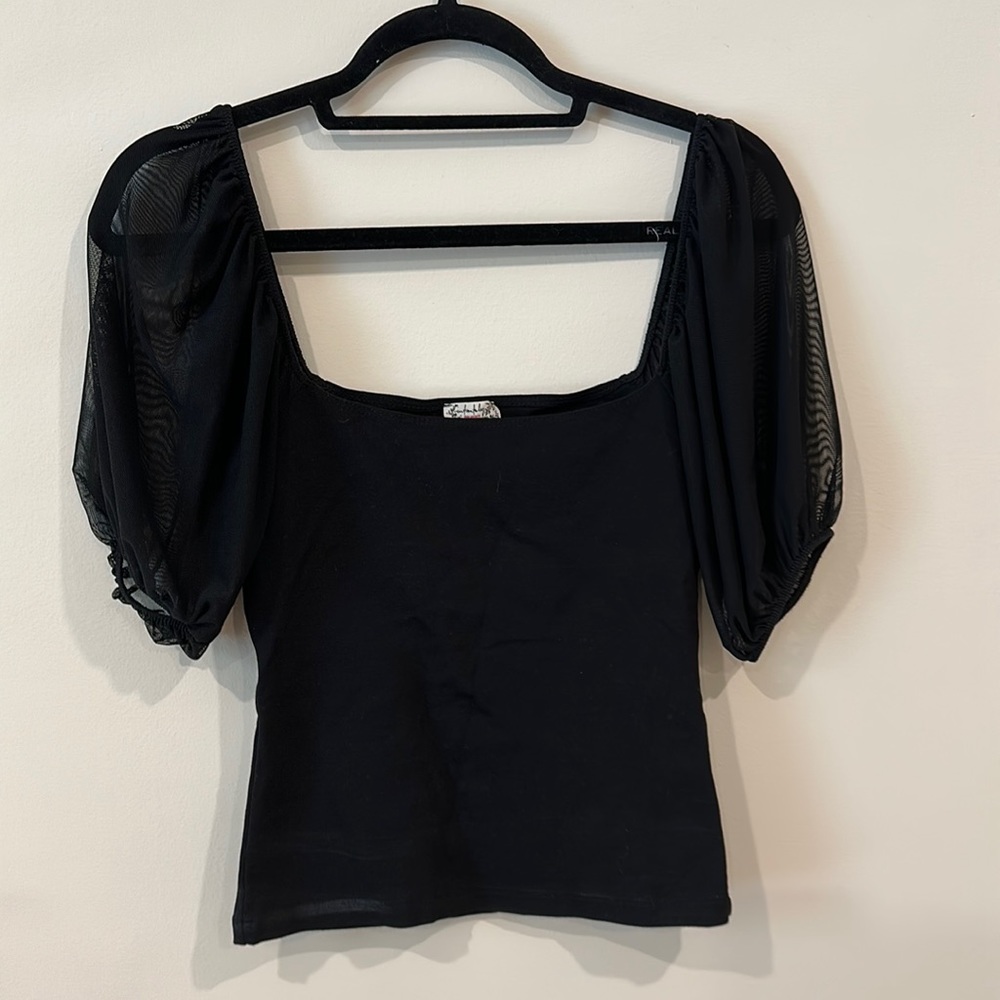 Black shirt with mesh sleeves
